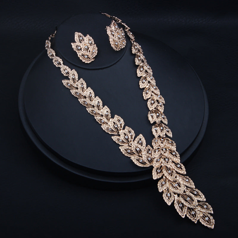 4PCS Gold Color Rhinestone Peacock Feather Necklaces Earrings Bracelet Rings Bridal Jewelry Sets Dubai Women Wedding Accessories