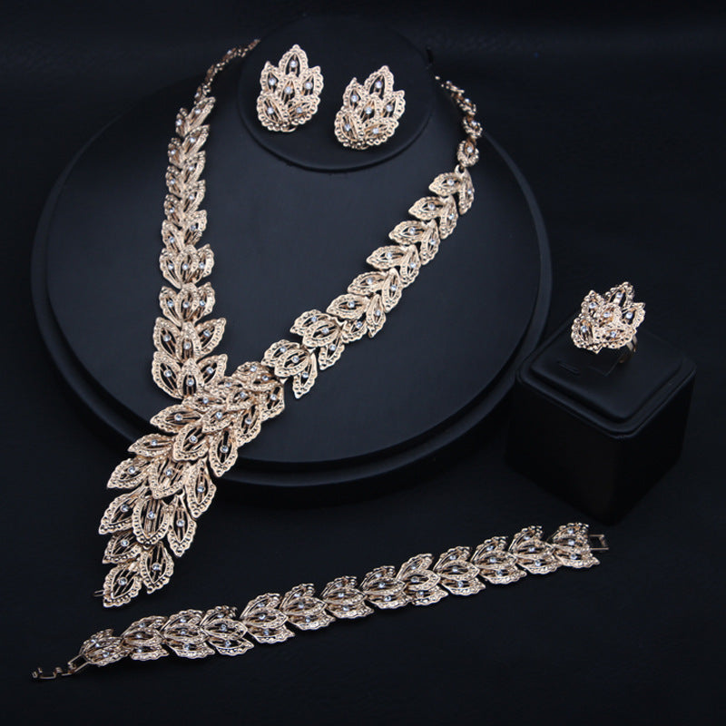 4PCS Gold Color Rhinestone Peacock Feather Necklaces Earrings Bracelet Rings Bridal Jewelry Sets Dubai Women Wedding Accessories